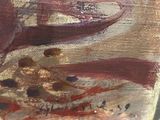 a close up of a painting of a fish on a table