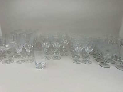 a lot of empty wine glasses on the table