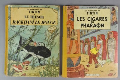 deux livres pour enfants sont posés l'un à côté de l'autre sur une table