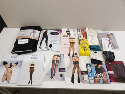 a lot of magazines on a table with a woman ' s underwear