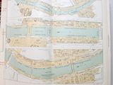 an open book with a map of a city on it
