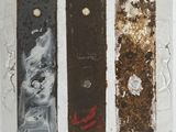 three pieces of artwork that are on the wall