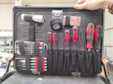 a black case with tools in it sitting on a table