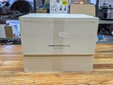 a box that is sitting on top of a wooden table
