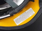 a close up of a helmet with a label on it