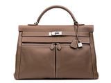 a brown leather handbag on a white background
