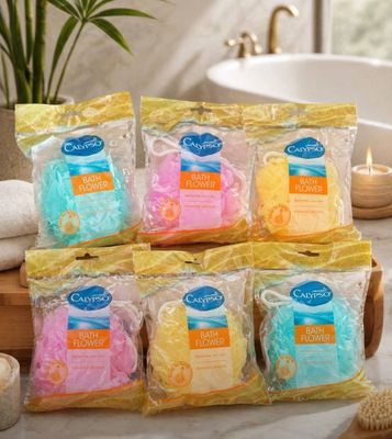 a group of bath bombs sitting on top of a counter next to a bath tub