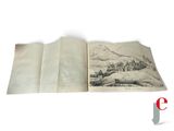 an open book with a picture of a castle on it