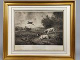 une reproduction encadrée représentant un chien poursuivant un oiseau dans un champ