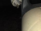 a close up view of a car ' s exhaust pipe and exhaust pipe