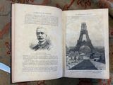 an open book with a picture of a man in front of the eiffel tower
