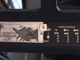 a close up of a gas pump with a price tag on it