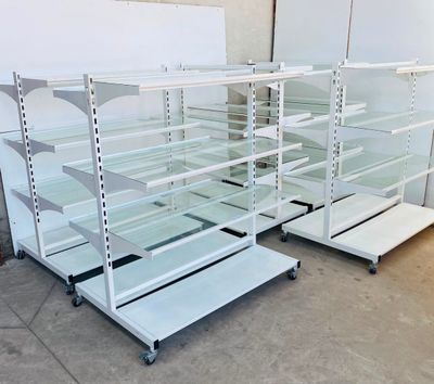 a lot of empty shelves in a warehouse