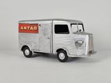 a toy truck that is sitting on a white surface