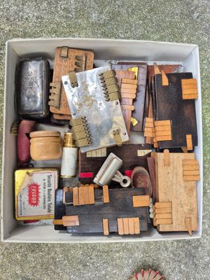 a box full of assorted items on the ground