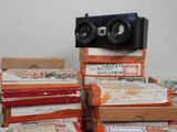 a stack of books with speakers on top of them