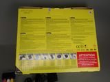 a box with a yellow label on it sitting on a table