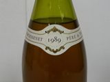 a bottle of wine that is sitting on a table
