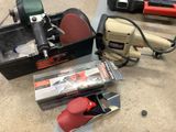 a box of tools sitting on the floor next to a box of tools