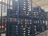 the warehouse is full of tires and pallets for sale