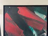 a picture of a picture of a painting on a shelf