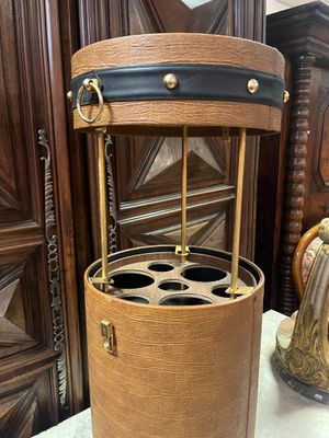 a wooden wine rack with six bottles inside of it