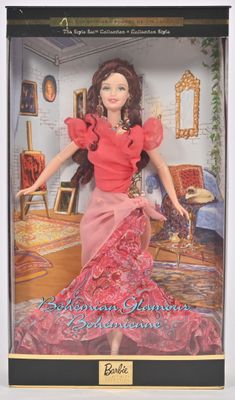 poupée Barbie dans une boîte, vêtue d'une robe rouge à passementerie dorée