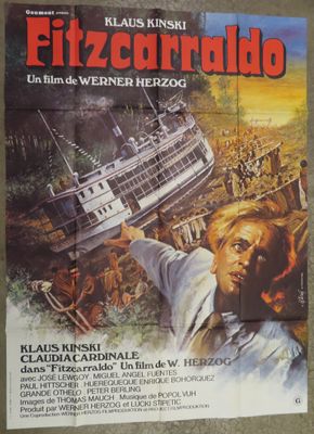 the poster for the movie fizzarado is hanging on the wall