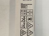 the back of a white box with black writing on it