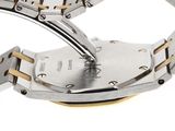 an image of a close up of a watch on a white surface