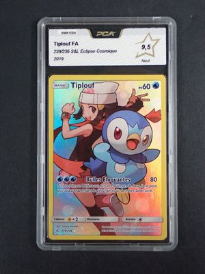 the pokemon trading card is in a plastic holder on a black surface