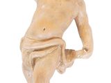an image of a small statue of a boy holding a tennis racquet