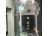 a close up of a car dashboard with a speedometer