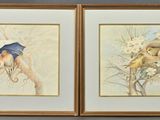 painting of two framed pictures of birds and flowers on a wall
