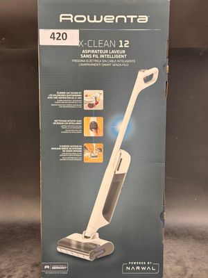 a box of a vacuum cleaner sitting on top of a counter