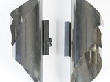 pair of chrome plated wall sconces with curved glass panels