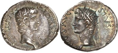 a silver coin with an image of a man on it