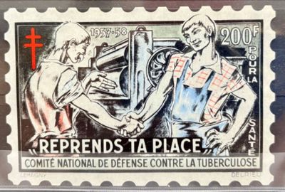 timbre-poste représentant un homme et une femme jouant du piano