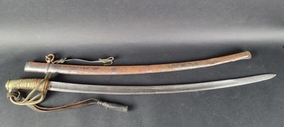a close up of two swords on a table with a rope
