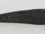 an image of a black object on a white surface