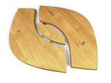 a close up of a wooden cutting board with two pieces cut out of it