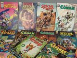 a lot of comic books that are on the table