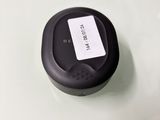 a remote control sitting on top of a white table