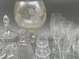 a lot of glass items that are sitting on a table