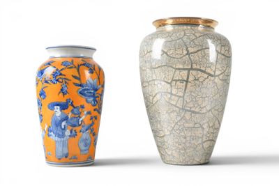 two vases sitting next to each other on a white surface