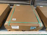 several boxes of cardboard are stacked on pallets in a warehouse