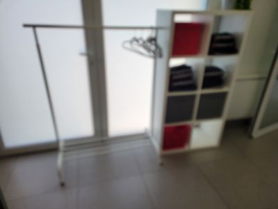 an image of a room with a closet and a sliding glass door