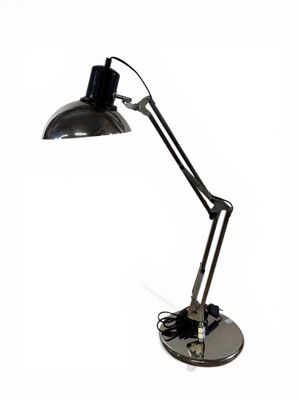 an image of a black desk lamp on a white background