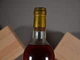 a bottle of wine that is sitting on a table
