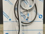 a white box with a hose attached to it and a box with a hose attached to it